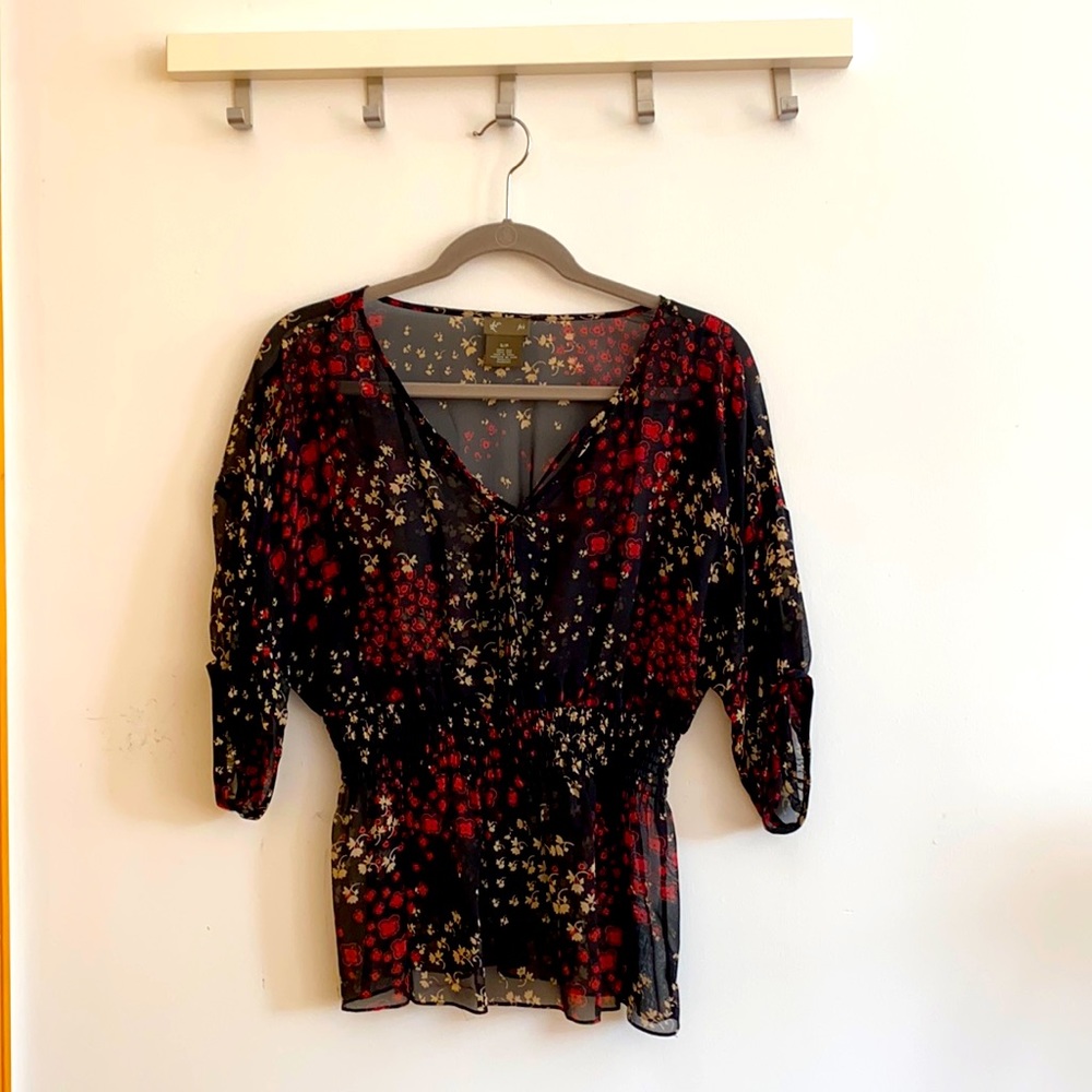 Anthropologie black floral print silk top